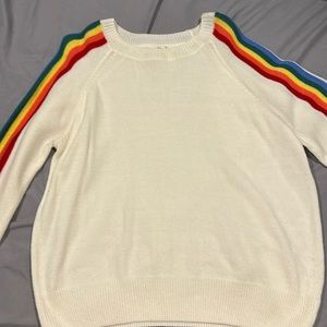 Woman cream rainbow sweater